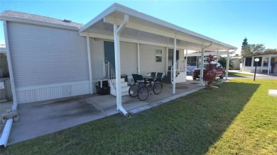 UPDATED SINGLE WIDE MOBILE HOME IN ACTIVE 55+ COMMUNITY! Stay on River Run Golf Links in Florida - for sale on GolfHomes.com, golf home, golf lot