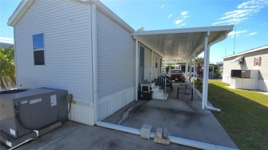 UPDATED SINGLE WIDE MOBILE HOME IN ACTIVE 55+ COMMUNITY! Stay on River Run Golf Links in Florida - for sale on GolfHomes.com, golf home, golf lot