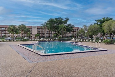 800 SW 125th Way 202 on Flamingo Lakes Country Club in Florida - for sale on GolfHomes.com, golf home, golf lot