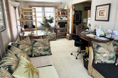 A nice-sized example of well cared for home in the premier on Six Lakes Country Club in Florida - for sale on GolfHomes.com, golf home, golf lot