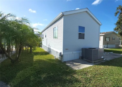UPDATED SINGLE WIDE MOBILE HOME IN ACTIVE 55+ COMMUNITY! Stay on River Run Golf Links in Florida - for sale on GolfHomes.com, golf home, golf lot