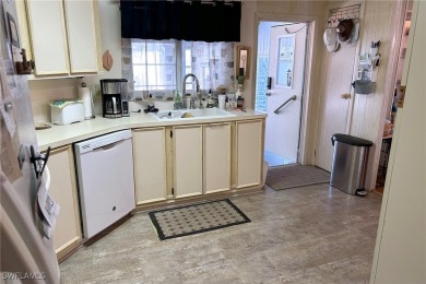 A nice-sized example of well cared for home in the premier on Six Lakes Country Club in Florida - for sale on GolfHomes.com, golf home, golf lot