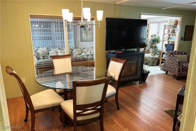A nice-sized example of well cared for home in the premier on Six Lakes Country Club in Florida - for sale on GolfHomes.com, golf home, golf lot