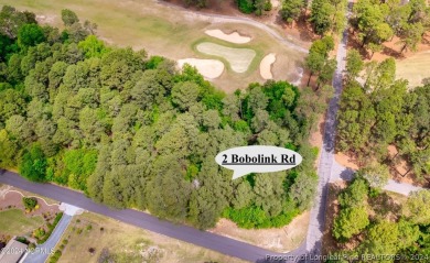 Build your dream home on this .74 acre, corner lot located on on Foxfire Golf and Country Club in North Carolina - for sale on GolfHomes.com, golf home, golf lot