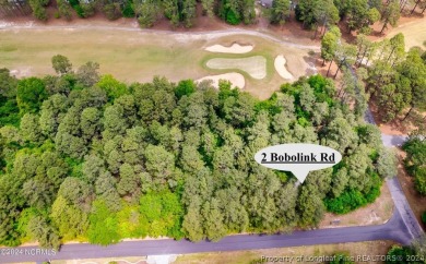 Build your dream home on this .74 acre, corner lot located on on Foxfire Golf and Country Club in North Carolina - for sale on GolfHomes.com, golf home, golf lot