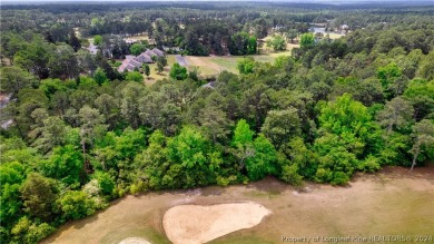 Build your dream home on this .74 acre, corner lot located on on Foxfire Golf and Country Club in North Carolina - for sale on GolfHomes.com, golf home, golf lot