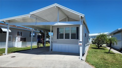 UPDATED SINGLE WIDE MOBILE HOME IN ACTIVE 55+ COMMUNITY! Stay on River Run Golf Links in Florida - for sale on GolfHomes.com, golf home, golf lot