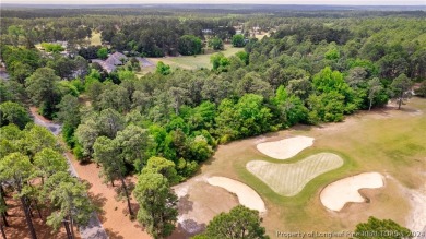 Build your dream home on this .74 acre, corner lot located on on Foxfire Golf and Country Club in North Carolina - for sale on GolfHomes.com, golf home, golf lot