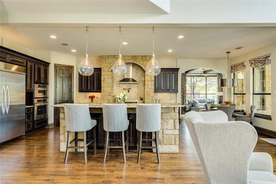 Positioned directly on the 18th hole of the award-winning golf on University of Texas Golf Club in Texas - for sale on GolfHomes.com, golf home, golf lot