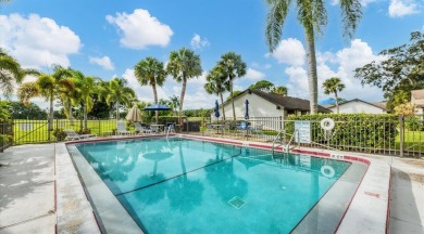 Fabulous golf course views from this updated end-unit in The on The Meadows Golf and Country Club in Florida - for sale on GolfHomes.com, golf home, golf lot