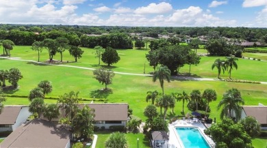 Fabulous golf course views from this updated end-unit in The on The Meadows Golf and Country Club in Florida - for sale on GolfHomes.com, golf home, golf lot