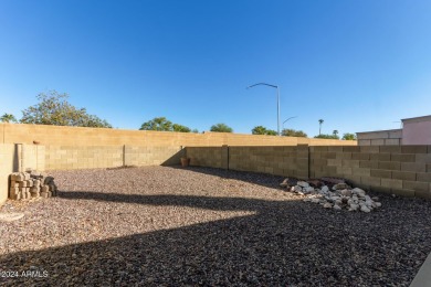 This charming 3-bedroom, 1.75-bath home is nestled on a quiet on Fountain of the Sun Country Club in Arizona - for sale on GolfHomes.com, golf home, golf lot