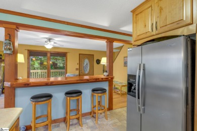 This charming mountain getaway offers a great location for all on The Rock At Jocassee in South Carolina - for sale on GolfHomes.com, golf home, golf lot