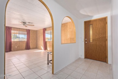 This charming 3-bedroom, 1.75-bath home is nestled on a quiet on Fountain of the Sun Country Club in Arizona - for sale on GolfHomes.com, golf home, golf lot