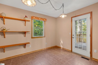 This charming mountain getaway offers a great location for all on The Rock At Jocassee in South Carolina - for sale on GolfHomes.com, golf home, golf lot