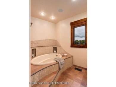 This stunning custom-built Jackson Hole Golf & Tennis home is on on Jackson Hole Golf and Tennis Club in Wyoming - for sale on GolfHomes.com, golf home, golf lot