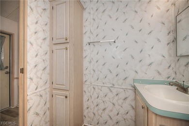 Located in Fountain View RV Resort, a well-established 55+ on Del Tura Golf and Country Club in Florida - for sale on GolfHomes.com, golf home, golf lot