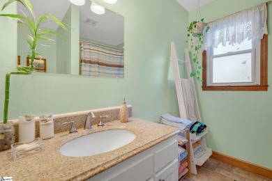 This charming mountain getaway offers a great location for all on The Rock At Jocassee in South Carolina - for sale on GolfHomes.com, golf home, golf lot