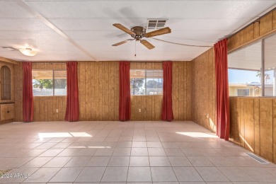 This charming 3-bedroom, 1.75-bath home is nestled on a quiet on Fountain of the Sun Country Club in Arizona - for sale on GolfHomes.com, golf home, golf lot