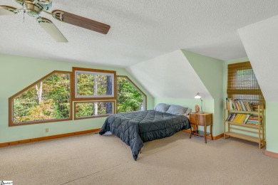 This charming mountain getaway offers a great location for all on The Rock At Jocassee in South Carolina - for sale on GolfHomes.com, golf home, golf lot