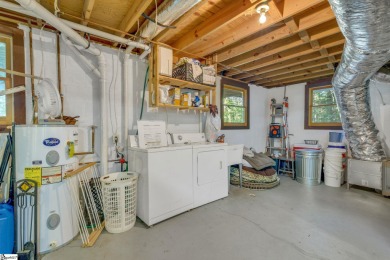 This charming mountain getaway offers a great location for all on The Rock At Jocassee in South Carolina - for sale on GolfHomes.com, golf home, golf lot
