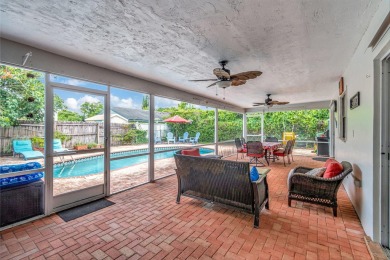 Discover this Delray Beach 4-bedroom, 2.5 bath pool home on Delray Beach Golf Club in Florida - for sale on GolfHomes.com, golf home, golf lot