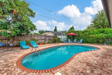 Discover this Delray Beach 4-bedroom, 2.5 bath pool home on Delray Beach Golf Club in Florida - for sale on GolfHomes.com, golf home, golf lot