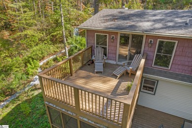 This charming mountain getaway offers a great location for all on The Rock At Jocassee in South Carolina - for sale on GolfHomes.com, golf home, golf lot