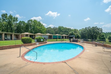 The stunning timeless architecture of these condominiums on Belvedere Golf Club in Arkansas - for sale on GolfHomes.com, golf home, golf lot