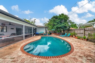 Discover this Delray Beach 4-bedroom, 2.5 bath pool home on Delray Beach Golf Club in Florida - for sale on GolfHomes.com, golf home, golf lot