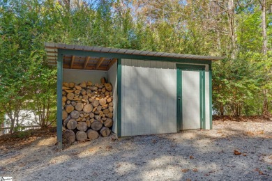 This charming mountain getaway offers a great location for all on The Rock At Jocassee in South Carolina - for sale on GolfHomes.com, golf home, golf lot