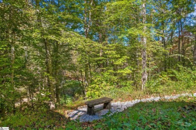 This charming mountain getaway offers a great location for all on The Rock At Jocassee in South Carolina - for sale on GolfHomes.com, golf home, golf lot