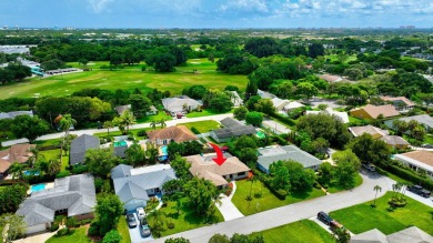 Discover this Delray Beach 4-bedroom, 2.5 bath pool home on Delray Beach Golf Club in Florida - for sale on GolfHomes.com, golf home, golf lot