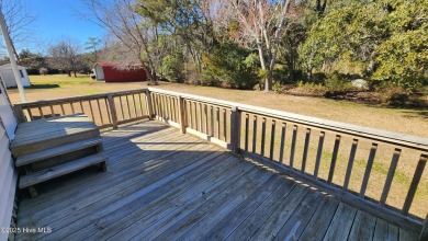 Ranch style three bedroom, two bath home on over an acre with on North River Club in North Carolina - for sale on GolfHomes.com, golf home, golf lot