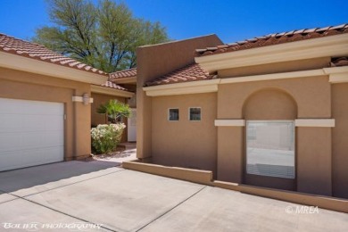 This gorgeous Summer Ridge townhome is tucked away at the end of on The Oasis Golf Club in Nevada - for sale on GolfHomes.com, golf home, golf lot