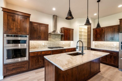 This beautifully crafted 3-bedroom, 2.5-bath home in the Powder on The Powder Horn Golf Club - Mountain in Wyoming - for sale on GolfHomes.com, golf home, golf lot