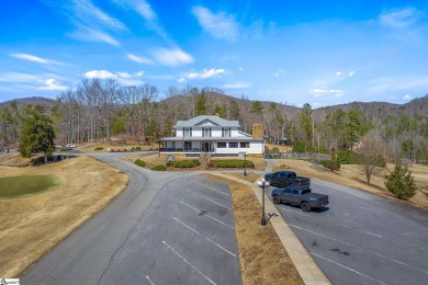 This charming mountain getaway offers a great location for all on The Rock At Jocassee in South Carolina - for sale on GolfHomes.com, golf home, golf lot