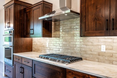This beautifully crafted 3-bedroom, 2.5-bath home in the Powder on The Powder Horn Golf Club - Mountain in Wyoming - for sale on GolfHomes.com, golf home, golf lot