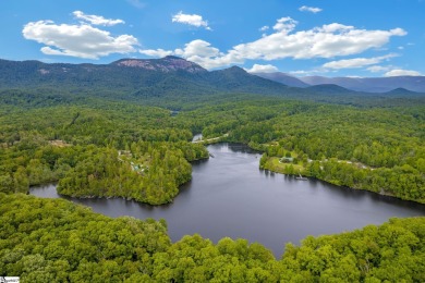 This charming mountain getaway offers a great location for all on The Rock At Jocassee in South Carolina - for sale on GolfHomes.com, golf home, golf lot