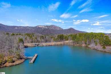 This charming mountain getaway offers a great location for all on The Rock At Jocassee in South Carolina - for sale on GolfHomes.com, golf home, golf lot