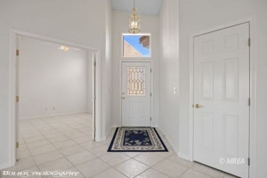 This gorgeous Summer Ridge townhome is tucked away at the end of on The Oasis Golf Club in Nevada - for sale on GolfHomes.com, golf home, golf lot