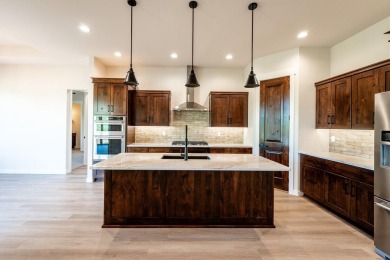 This beautifully crafted 3-bedroom, 2.5-bath home in the Powder on The Powder Horn Golf Club - Mountain in Wyoming - for sale on GolfHomes.com, golf home, golf lot