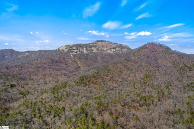 This charming mountain getaway offers a great location for all on The Rock At Jocassee in South Carolina - for sale on GolfHomes.com, golf home, golf lot
