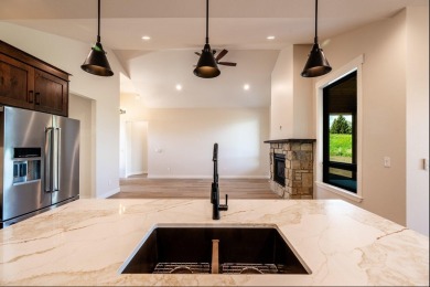 This beautifully crafted 3-bedroom, 2.5-bath home in the Powder on The Powder Horn Golf Club - Mountain in Wyoming - for sale on GolfHomes.com, golf home, golf lot