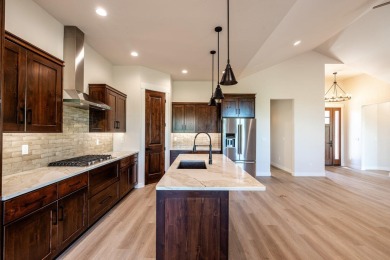 This beautifully crafted 3-bedroom, 2.5-bath home in the Powder on The Powder Horn Golf Club - Mountain in Wyoming - for sale on GolfHomes.com, golf home, golf lot