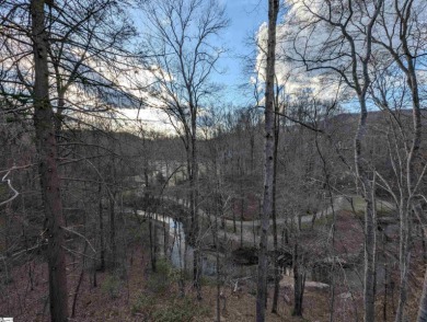 This charming mountain getaway offers a great location for all on The Rock At Jocassee in South Carolina - for sale on GolfHomes.com, golf home, golf lot