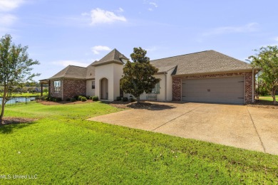 Beautiful waterfront home in the gated community of the Shores on Lake Caroline Golf Club in Mississippi - for sale on GolfHomes.com, golf home, golf lot