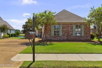 Beautiful waterfront home in the gated community of the Shores on Lake Caroline Golf Club in Mississippi - for sale on GolfHomes.com, golf home, golf lot