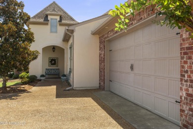 Beautiful waterfront home in the gated community of the Shores on Lake Caroline Golf Club in Mississippi - for sale on GolfHomes.com, golf home, golf lot