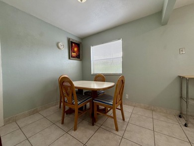 Ground floor 2 bedroom, 2 bath true corner unit with canal view on Addison Reserve in Florida - for sale on GolfHomes.com, golf home, golf lot